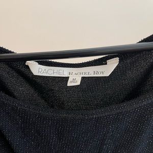 Stretchy black dress with pockets with quarter length sleeves